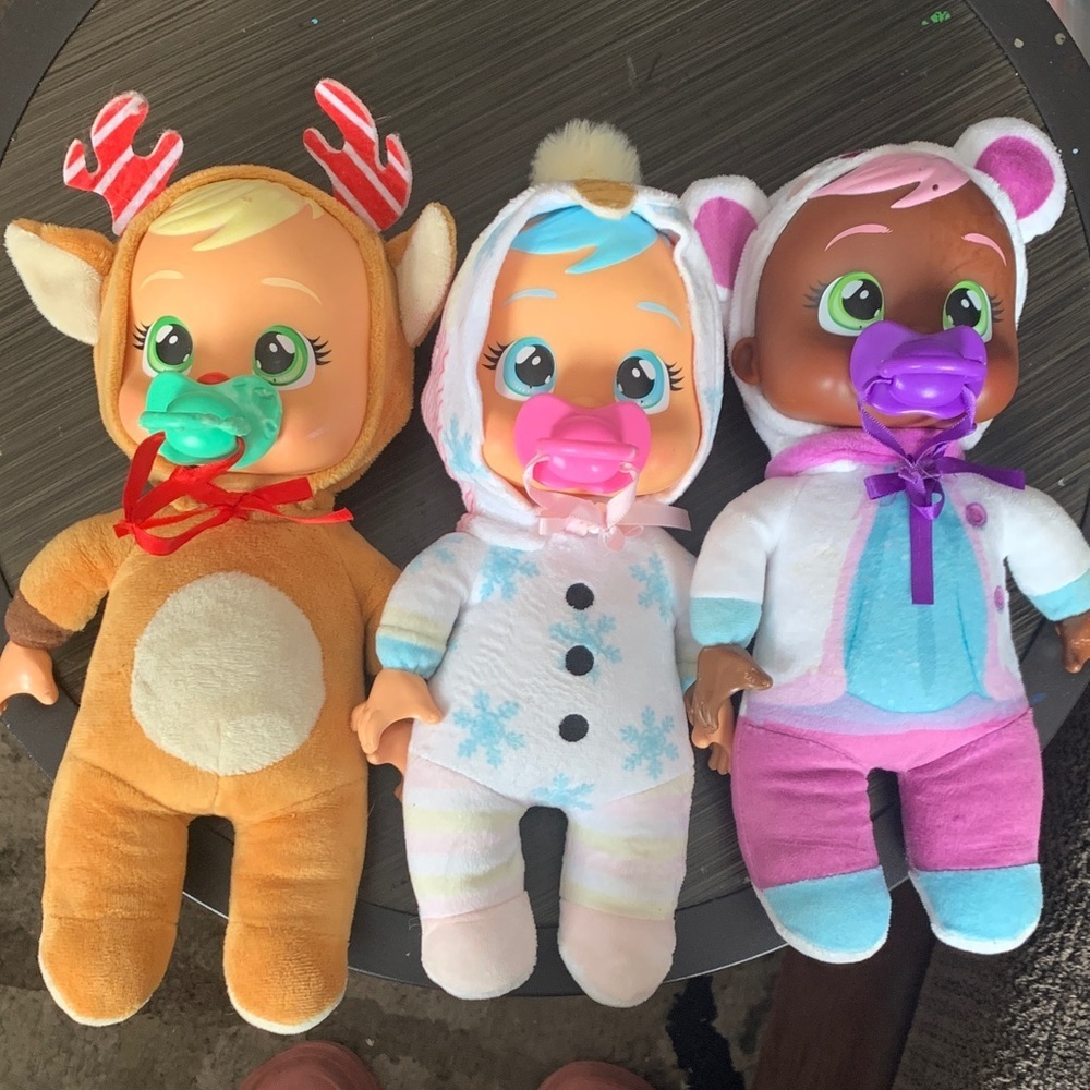 Charming Trio of Baby Dolls with Pacifiers